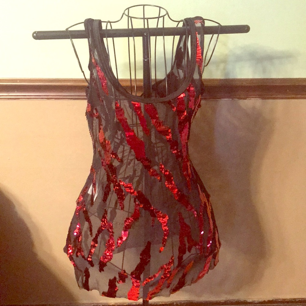 A black shear see-through dress